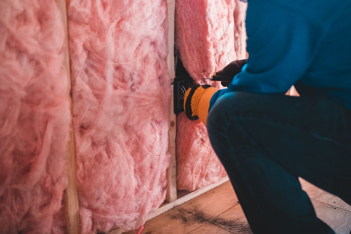 24/7 HVAC Services in USA technician servicing a heating and cooling unit